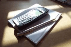 Telefon, Block, Stift, ein Foto von meinem Freund Dr. Walter Hendrix